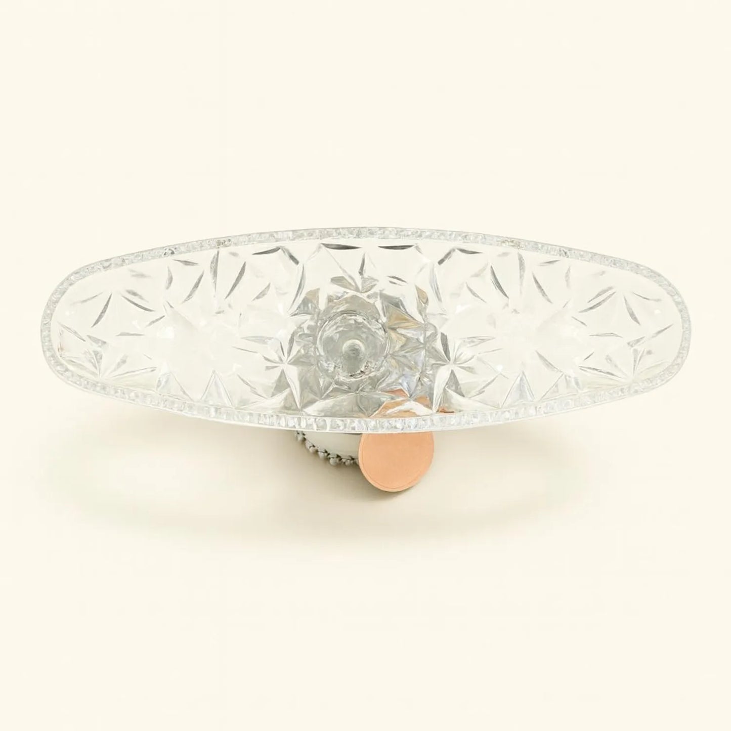 Decorative crystal cake stand on a white background